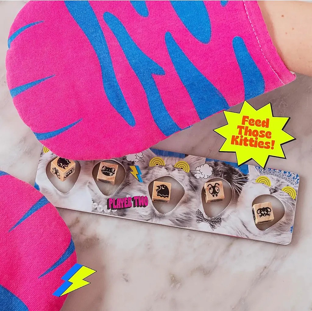 The cat mitt game dice mittens and game board