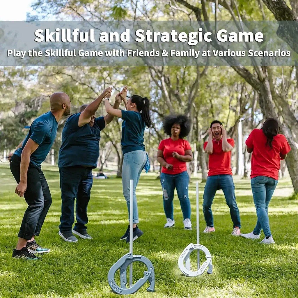 Group of friends playing team Horseshoes outside in a park, laughing, high-fiving, and having a fun time. Competative fun outdoor game
