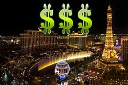 Bright lights of Las Vegas Strip showcasing the iconic Eiffel Tower and Bellagio fountains at night. three green dollar signs are superimposed